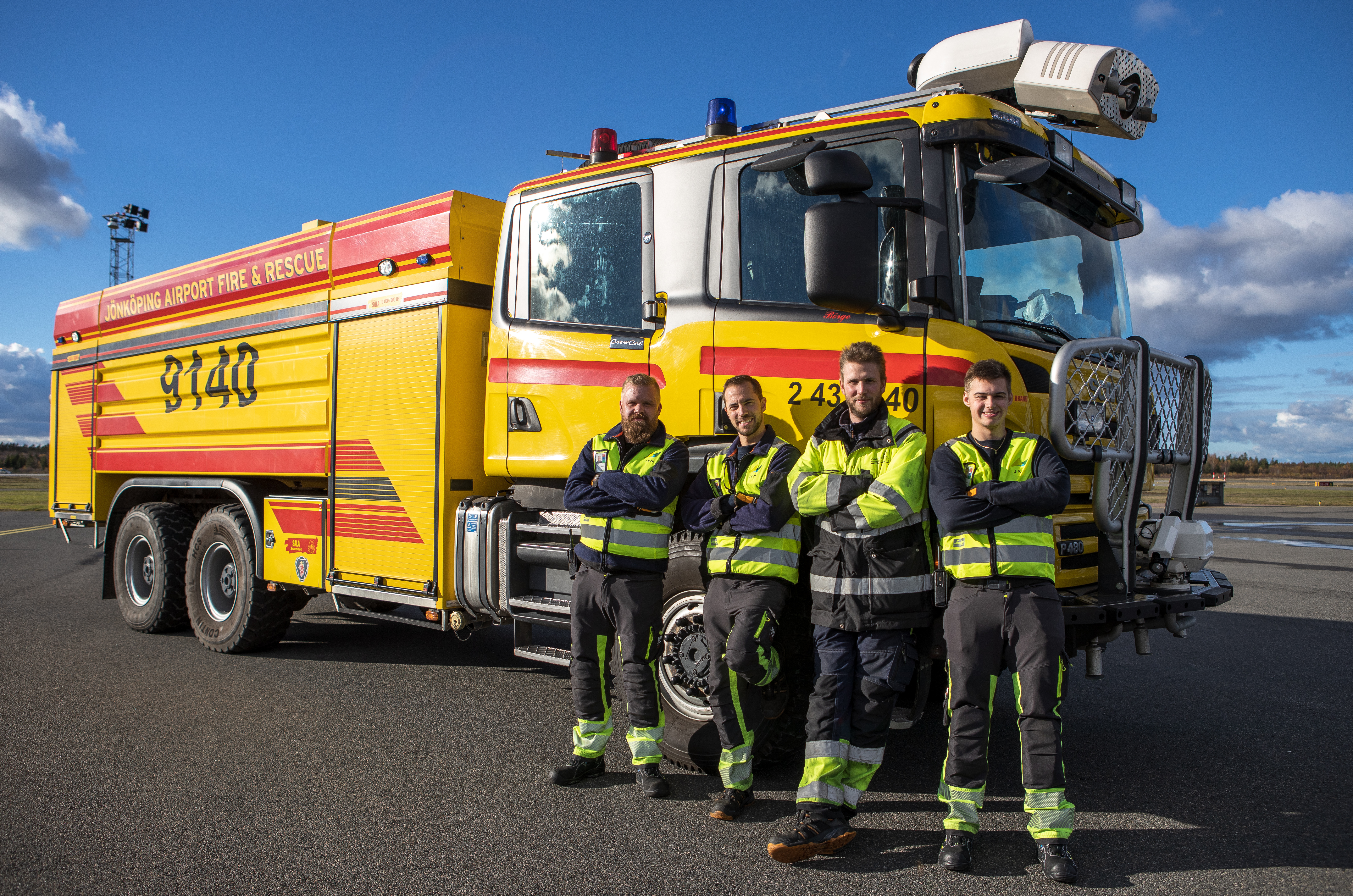 Flygplatsbrandmän porträtt